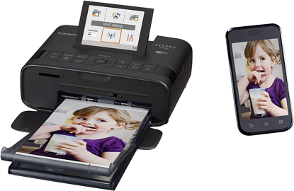 Agrandir l'image de Canon SELPHY CP1300 imprimante Photo Sublimation de Teinte WiFi - Imprimantes Photo (Sublimation de Teinte, Cassette, LCD, 8,13 cm (3.2"), Noir, Domestique et Professionnel) Image de Canon SELPHY CP1300 imprimante Photo Sublimation de Teinte WiFi - Imprimantes Photo (Sublimation de Teinte, Cassette, LCD, 8,13 cm (3.2"), Noir, Domestique et Professionnel)