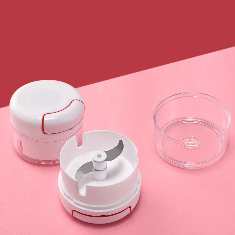 Mini hachoir manuel à fil multifonctionnel pour cuisine.