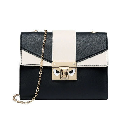 sac-a-main-bicolore-pour-femme-en-bandouliere Sac à main bicolore pour femme en bandoulière.