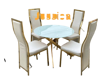 Image sur salle a manger 4 Places vitrer ( importer )  avec des bordures de couleur Or et ses chaises