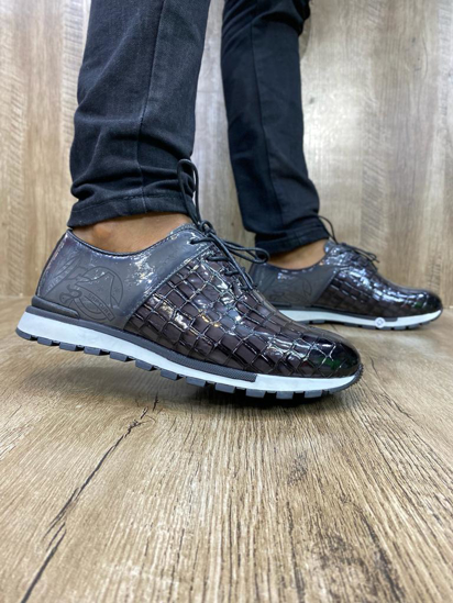Image sur Chaussure classe en cuir Berluti noire, produit générique