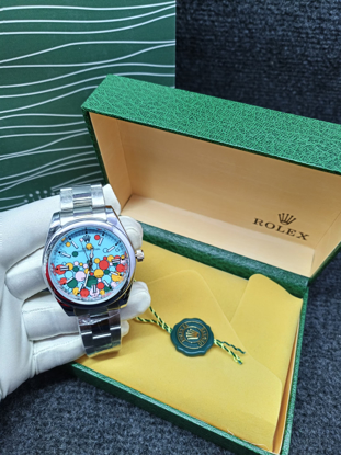 Agrandir l'image de Montre Rolex mixte en Acier Inoxydable, dans son carton, Produit générique Image de Montre Rolex mixte en Acier Inoxydable, dans son carton, Produit générique
